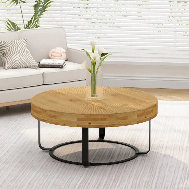 Contemporary Round Wooden Coffee Table with Intricate Carving and Metal Legs 10