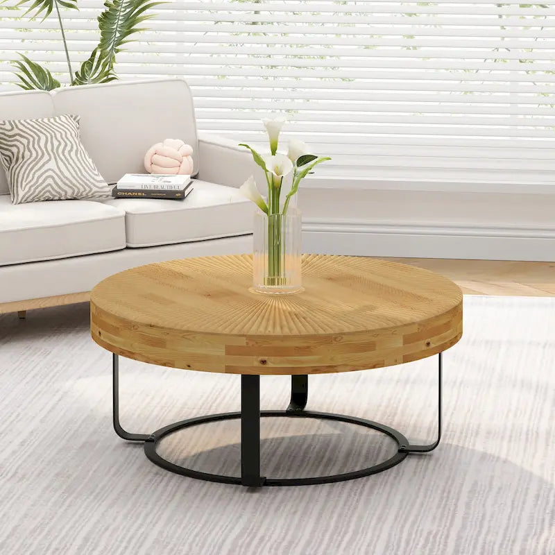 Contemporary Round Wooden Coffee Table with Intricate Carving and Metal Legs 1